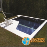 construção de piscina de alvenaria com escada Santos