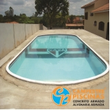 construção de piscina de alvenaria com prainha Jardins