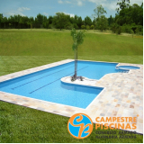 piscina de concreto com deck para condomínio Vila Romana
