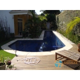 piscina de concreto com revestimento Jardins